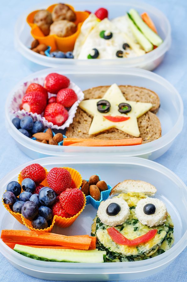 School Lunch Boxes For Kids With Food In The Form Of Funny Faces ...